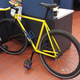 My old fixie, aka “Nimbus”, at my old place of work. Awkward to store, awkward to ride...I still miss it sometimes.